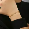 Estilo Europeu e Americano Trevo de Quatro Folhas Cravejado com Diamantes Aço Inoxidável Banhado a Ouro 18K Pulseira de Luxo de Nicho High-End para Mulheres Versátil Atacado
