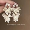Pendientes de flores blancas retro francesas de Super Fairy, ligeros, lujosos, exquisitos, de alta gama, con temperamento, a la moda, personalizados y combinables.