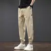 Calça masculina elástica na cintura, transfronteiriça, leve, slim fit, comprimento no tornozelo, moderna, adequada para o verão, adolescentes e estudantes, uso casual