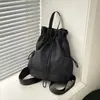 Mochila de diseño nicho transfronteriza 2026 para mujer, ligera de verano, casual, con cordón, versátil para el trabajo y los viajes