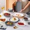 Vajilla de cerámica con patrón de piedra especial textura cóncava-convexa gris blanco avanzado superficie brillante Estilo simple Ins plato para el hogar tazón para restaurante