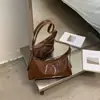 Bolsos de Mujer de Nicho Modernos y Tendencia Verano 2026 Nuevo Bolso de Hombro y Axila para el Trabajo con un Toque de Lujo para Salidas