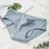 Ropa interior de dama personalizada de fábrica al por mayor algodón tiro medio lazo calzones de estudiante color sólido ropa interior sencilla para niña