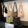 Outono e inverno grande capacidade feminina 2025 nova leve bordado arco plissado ombro bolsa crossbody bolsa de viagem