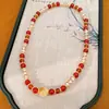 Pulsera apilada de cuentas de vidrio y ojo de tigre, sensación de lujo ligero de nicho de alta gama, accesorio de muñeca versátil casual Maillard