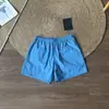 Verano secado rápido estilo minimalista exterior casual cordón cintura elástica shorts de playa de cinco puntos 12884