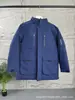 Putian Versión de Alta Gama Primera Generación Logo Grande Ropa de Trabajo Tercera Generación Parka Chaqueta de Plumas Segunda Generación Cuello Grande de Piel Unisex Abrigo de Longitud Media