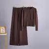 Conjunto de cárdigan de punto de punto de cruz Moda de otoño/invierno 2026 Nuevo europeo y americano Conjunto de suéter y pantalones de punto de manga larga de ajuste delgado de cintura baja