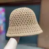 Nuevo Sombrero de Pescador de Primavera y Verano Sombrilla Sombrero Protector Solar Paja Tejido Calado Cúpula Hueca Sombrero de Cubo Elegante Combinable Plegable