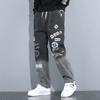 YOA Otoño Nuevo Jeans Estampados con Letras para Hombre Marca de Moda Pantalones Sueltos de Graffiti de Dibujos Animados Pantalones con Cordón Ins