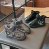 Botas de Nieve para Niños 2026 Estilo Nuevo Felpa Gruesa Superficie de Cuero para Niñas Impermeables Zapatos de Algodón Calidez Zapatos para Niños Botas de Invierno Versátiles