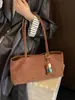 Bolso grande de alta costura vintage para mujer, nuevo bolso de hombro texturizado de nicho para principios de otoño de 2026, bolso simple de axila