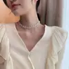 Corea del Sur Dongdaemun estilo ins simple estilo frío collar de cuentas de cristal banda para el pelo corta collar lateral de encaje para mujer