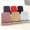 Suporte de desktop do telefone móvel criativo simples portátil dobrável suporte do telefone móvel multi-uso pequeno quadro de apoio base preguiçosa