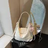 Bolsa Retro de Grande Capacidade para Mulheres 2026 Novo Design de Nicho Bolsa de Ombro Único Transversal Mochila Leve