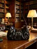 Bolsa Nueva para Mujer Primavera/Verano 2026 Bolso de Hombro Único de Cuero PU Estilo Chica Caliente Y2K Bolso para Mujer Artículo de Venta Caliente Transfronterizo