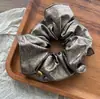 Estilo Coreano Moda Couro Macio Oval Etiqueta Dourada Scrunchie Prendedor de Cabelo para Mulheres Estilo Preguiçoso Retrô Scrunchie para Rabo de Cavalo Baixo