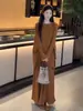 Conjunto de Roupa de Alto Padrão e Deslumbrantemente Lindo Mais Vendido: um Conjunto de Duas Peças com Top de Moda e Saia, de Estilo Francês, Vibrante e que Valoriza a Figura