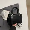 Bolso bandolera cruzado de hombro de moda de color liso popular para mujer 2026, nuevo bolso cuadrado pequeño casual para ir al trabajo, versátil