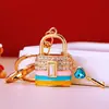 Exquisita Cabeza de Cerradura de Llave Completa de Diamante Colgante Llavero de Coche para Hombres y Mujeres Bolsa Anillo Llavero de Metal Regalo Transfronterizo Venta al por Mayor
