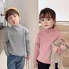 [em estoque outono e inverno novo gola alta meia versão coreana de suéter para meninos e meninas bebê cor sólida estilo estrangeiro suéter versátil para se aquecer