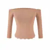 Conjunto de top de tricô ombro a ombro e saia puramente atraente e sexy com um design único apresentando um recorte e uma silhueta ajustada