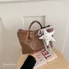 Bolso Cubo Tejido de Nicho Transfronterizo Nuevo Estilo 2026 Moda Canasta de Verduras Bolso de Mujer Simple de Hombro Cruzado Bolso de Mano