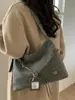 Bolsa Tote de Grande Capacidade Outono e Inverno para Mulheres 2025 Novo Estilo Popular Este Ano Retro Nicho Bolsa de Ombro Transversal para o Dia a Dia