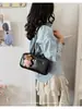 Bolsa de Axila com Padrão de Lichia Super Popular Coreana para Mulheres 2026 Nova Tendência Moda Maleta de Alto Padrão Bolsa Tote de Grande Capacidade