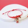 Yiwu pequeña mercancía Año Nuevo pulsera de cuerda roja joyería femenina al por mayor temperamento artístico linda pulsera de cerámica roja pulsera