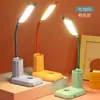 Nueva lámpara de mesa pequeña de dibujos animados LED mini portalápices manguera de almacenamiento luz de noche dormitorio dormitorio mesita de noche lámpara de mesa portátil