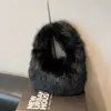 Bolso de Piel para Axila de Moda para Mujer 2026 Nuevo de Gama Alta Gran Capacidad de Felpa Portátil de Mano Bolso de Hombro Versátil para el Viaje Diario