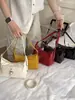 Bolsa de Mão Nova Retro Transfronteiriça Verão 2026 com Design Simples de Fivela de Cinto, Versátil para o Dia a Dia, Bolsa de Ombro Cruzada