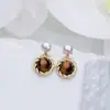 Aretes de Perla de Agua Dulce Natural para Mujer Ojo de Tigre Adornos de Oreja Retro Triángulo Lujo Ligero Nicho Sensación de Alta Gama Pendientes Venta al por Mayor