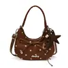 Exquisito bolso de lunares de nicho para mujer, nuevo bolso cruzado versátil de moda 2026, bolso de mano elegante de alta gama