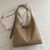 Bolsa de Mão Feminina Estilo Hong Kong Moda 2025 Nova Bolsa de Ombro Retrô Texturizada Verão Bolsa Tote Balde para Deslocamento