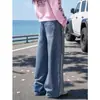 Jeans retro americanos originales lavados, deconstruidos, con tres rayas y pierna curva, un nuevo estilo de moda con patchwork de rayas y pierna ancha