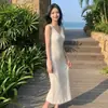 2026 Elegante Socialité Estilo Hong Kong Retro Seda de Hielo Encaje Hueco Vestido de Tirantes Dulce Picante Femenino Largo