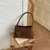 Bolsa de Ombro Tecida Estilosa Xiaomi Estilo Francês Nicho Feminina Outono 2026 Nova Bolsa Estilosa para o Dia a Dia Bolsa de Ombro Retrô