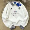 Moletom Spliced Gola Polo Retro Americano Falso Duas Peças para Mulheres Outono e Inverno 2025 Versátil Estampa de Letras Top Solto