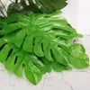 Folha de bananeira simulada Monstera flores artificiais plantas verdes projeto de varanda decoração de display de restaurante decoração de planta verde fileira grama