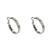 Estilo retro francés, pendientes de aro grandes de textura metálica única y exagerada para mujer, diseño elegante y simple con un ambiente fresco y minimalista.