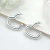 Pendientes versátiles de temperamento de alta gama estilo Hepburn de Instagram pendientes en forma de corazón pendientes de botón de corazón tridimensionales exquisitos a la moda simples