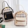 Comercio exterior bolsos de mujer al por mayor 2022 moda Mochila pequeña de cuadros bolso de hombro cruzado para mujer una generación de gastos de envío