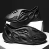 Amazon Wish Sitio Independiente Más Vendidos Zapatos Perforados Estilo Coco Zapatos de Hombre Verano 2022 Sandalias Transpirables Zapatos de Playa