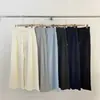 ¡Artículos de Alta Calidad desde Guangzhou! Pantalones de pierna ancha hasta el suelo con cordón, de caída fluida, para la temporada de primavera 2026, que son súper estilizados para mujer