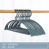 Percha Sin Costuras para Ropa Hogareña Semicircular Engrosada de Hombro Ancho Tendedero Antideslizante Estilo Audaz Percha de Plástico Sin Costuras Venta al por Mayor en Stock