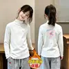 Nueva Camiseta Base de Manga Larga con Cuello Alto y Volantes para Niñas Otoño Invierno Polar Térmico Ropa Interior para Niños Pequeños y Medianos Top Cepillado