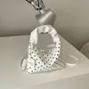 Bolso de axila único de lunares estilo coreano transfronterizo para mujer, nuevo bolso de hombro único otoño 2026, bolso de mano retro francés, bolso tipo empanada
