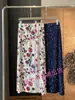 Ventas Directas de Fábrica de Faldas de Alta Gama Exquisitas, Faldas con Estampado Floral Súper Populares, Faldas de Largo Medio Holgadas que Cubren el Cuerpo, Estilo Issey Miyake